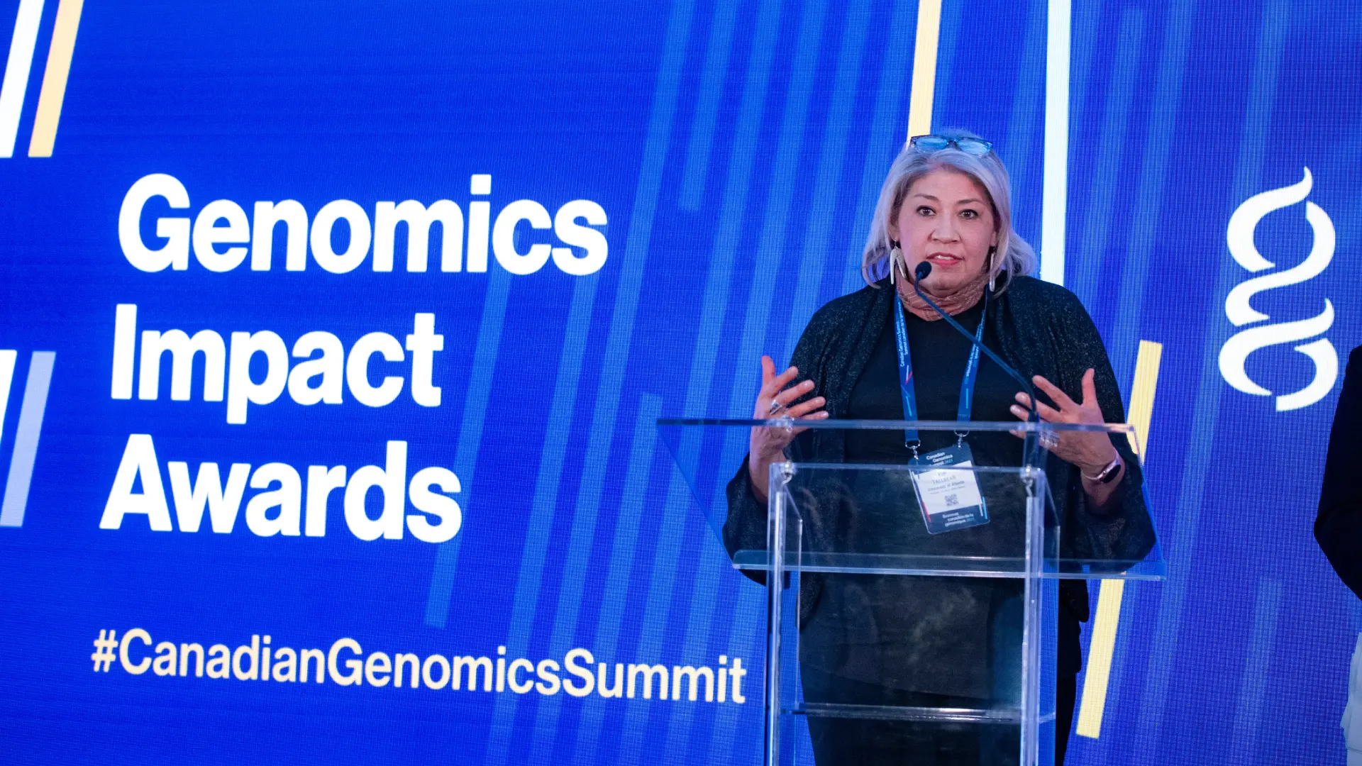 Kim TallBear giving a speech after receiving the Genomics Impact Award