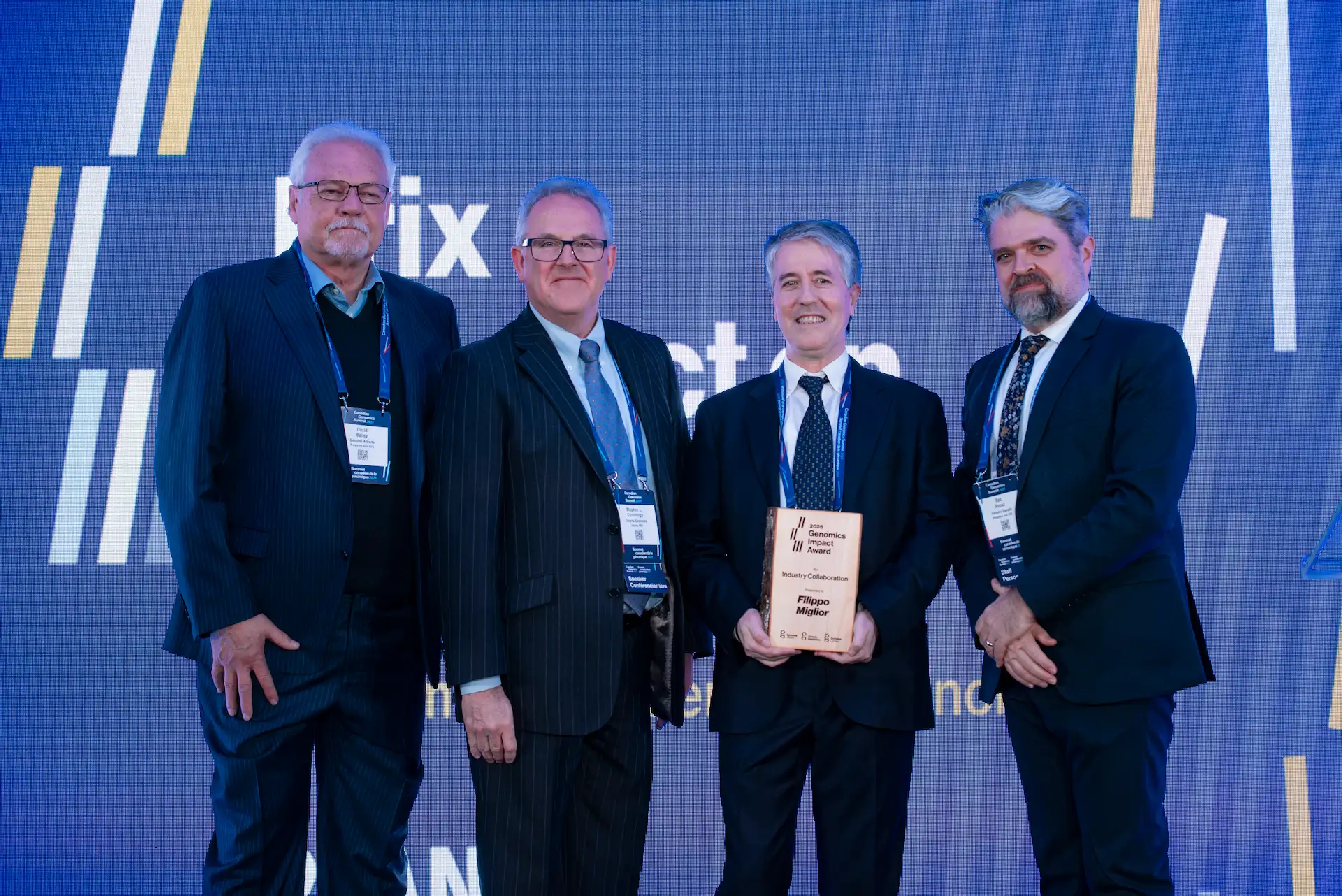 Filippo Miglior receiving Genome Canada's Industry Collaboration Award